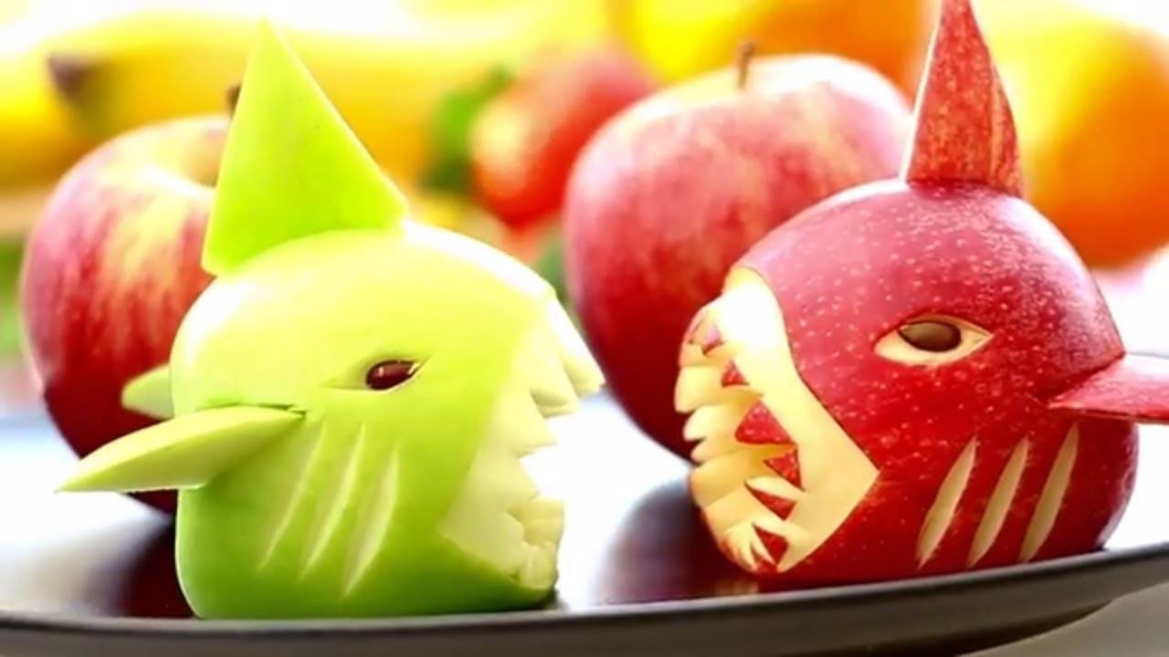 Apples carved into sharks.